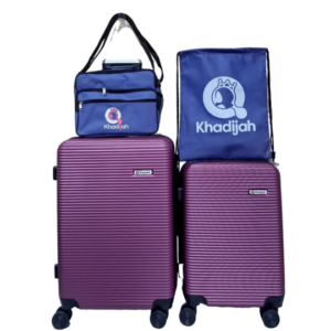 Koper fiber dan tas warna ungu dengan garis tegas tampak kokoh untuk perlengkapan umroh dan travel